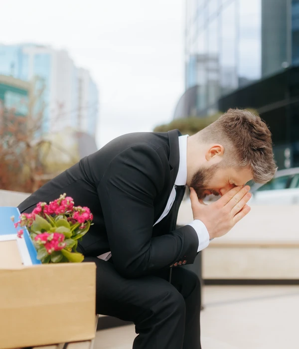 liberty-mental-health-man-suit-sitting-bench-box-flowers-page